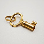 Load image into Gallery viewer, 21012808 18k Gold key pendant.