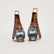 21012686 14k Rose Gold Topaz Earrings.